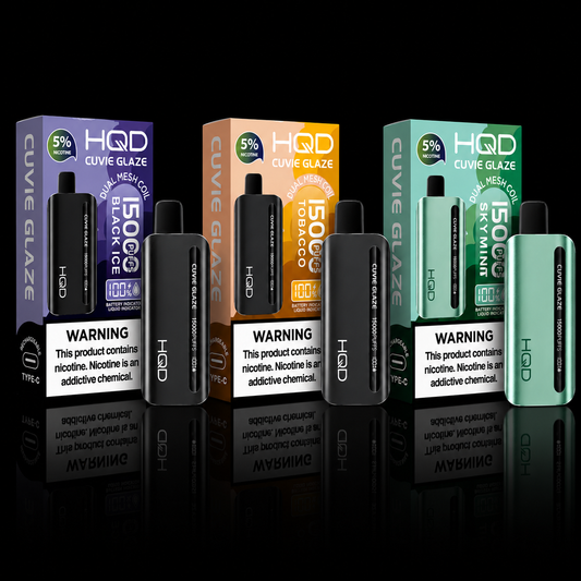 HQD Cuvie Glaze 15000 Puff disposable vape collection featuring Black Ice, Tobacco, and Sky Mint flavors with matching devices and retail packaging displayed on a black background.